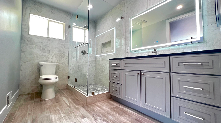 light grey bathroom with a white wc
